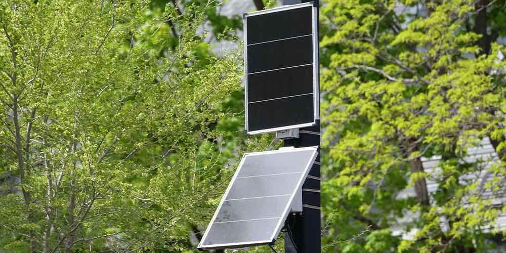 Solar smart street light pole with panels