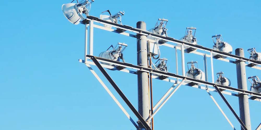 Reinforced lighting poles for high wind regions