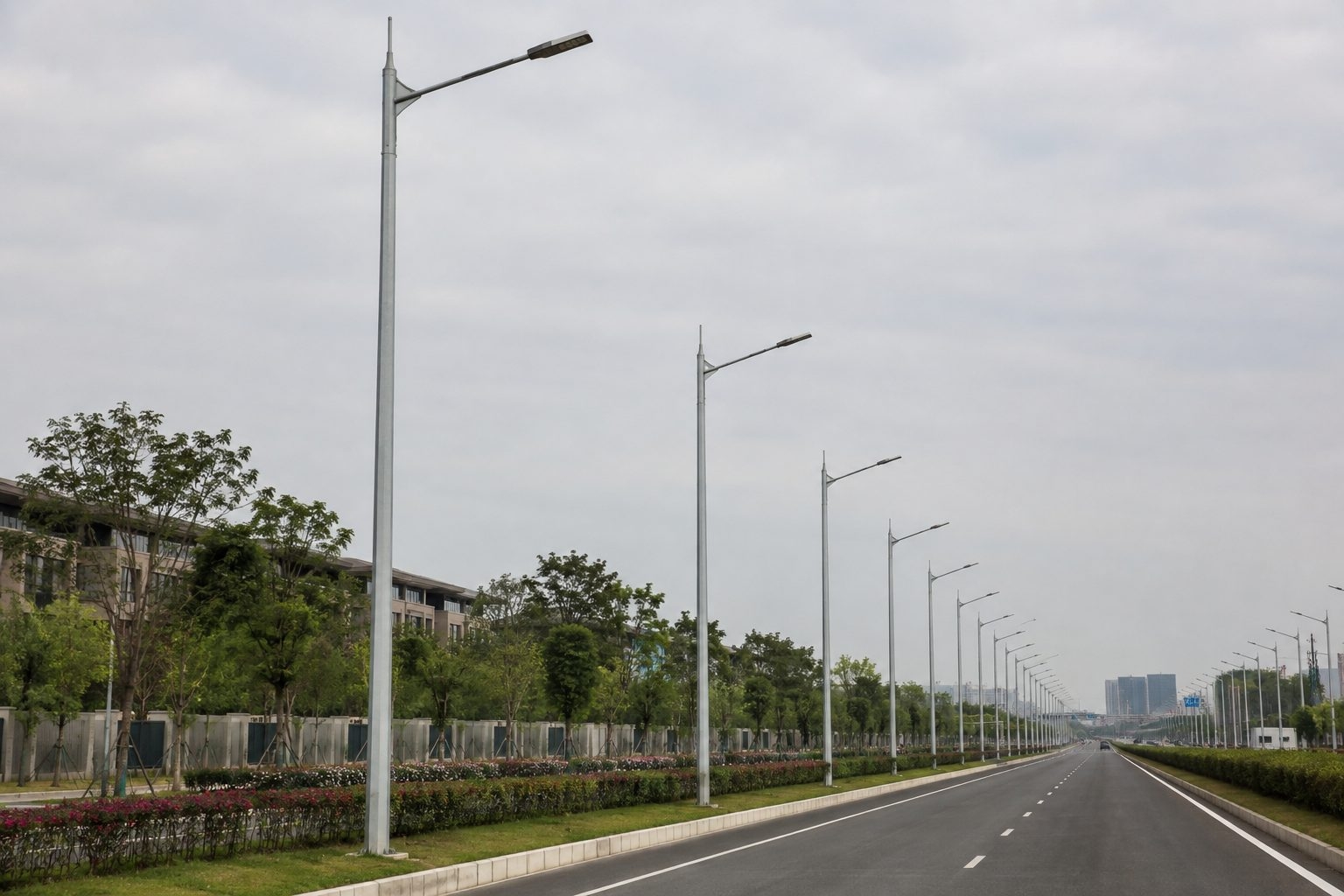 Fabrication of tapered polygonal steel street light pole shafts in a factory